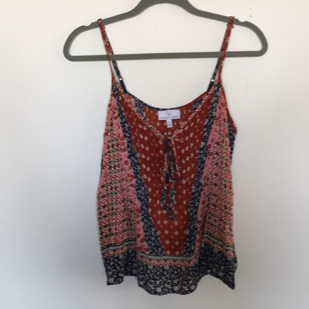 Patrons of a peace tank top